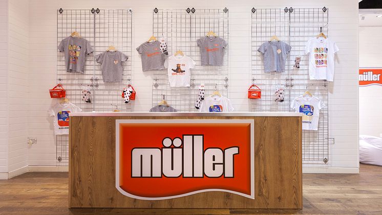 Merchandise stand at the Müller Corner Shop 