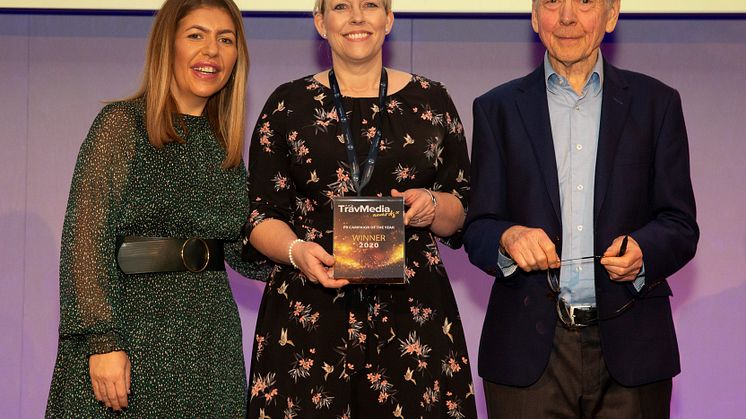 Rachael Jackson, Fred. Olsen Cruise Lines' Public Relations Manager (centre), receives the 'PR Campaign of the Year' award at the inaugural 'TravMedia Awards 2020' from John Humphrys, TV broadcaster / journalist and Louise Napier of TravMedia.     