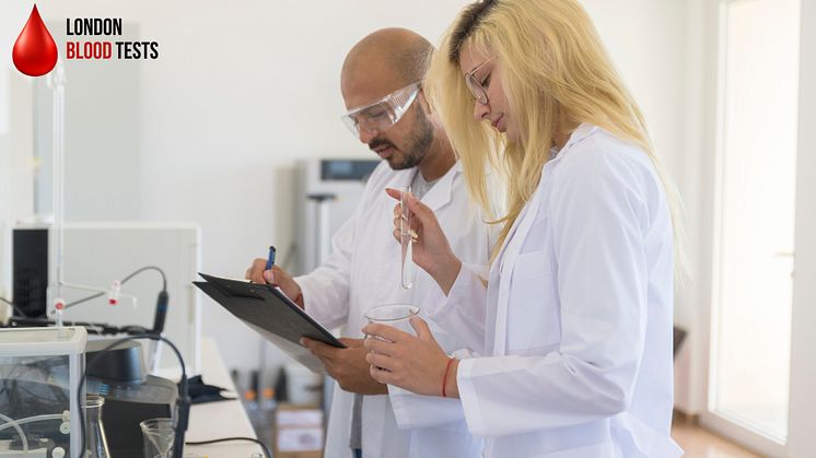 Lab technicians analysing blood samples at London Blood Tests 
