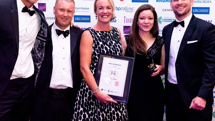 Cofounder of Isansys, Rebecca Weir, and PR and Marketing Executive of Isansys Georgina Horton, collecting the Best Use of Technology award