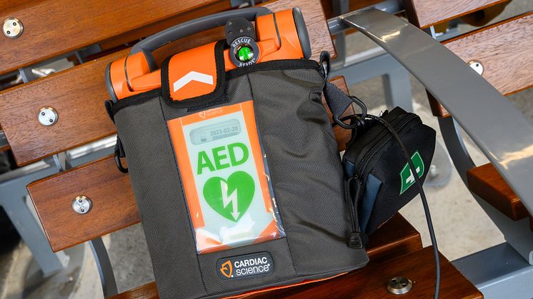 Defibrillators at every station - close up of defibrillator on station bench