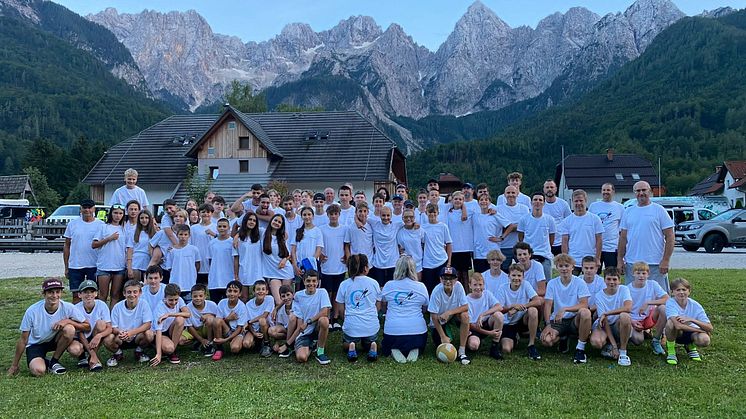 The group picture with tshirts. On the back is the logo