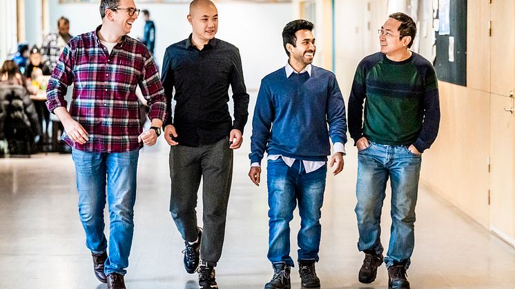 Artificial-organic-neurons-researchers on walk small