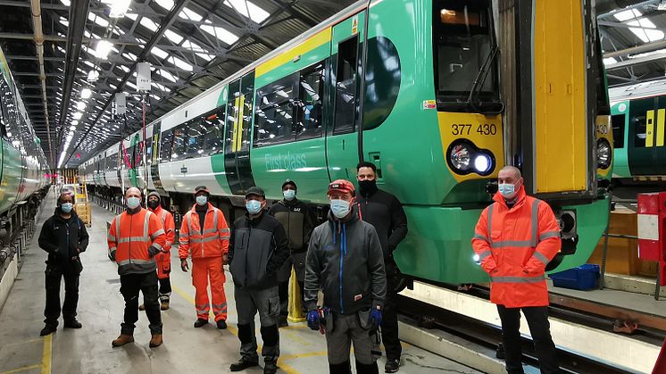 GTR Overhaul Manager Peter Hewitt (right) and his team with the updated Electrostar 377430 at Selhurst Depot