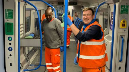 Cleaners applying the long-lasting viruscide to trains at Bedford 24 April