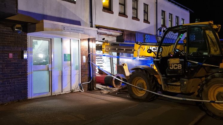 Hole in the wall: The JCB before it was removed - Picture Network Rail