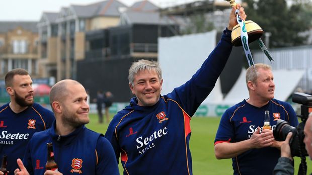 Essex Head Coach Chris Silverwood lifting the Specsavers County Championship trophy 2017