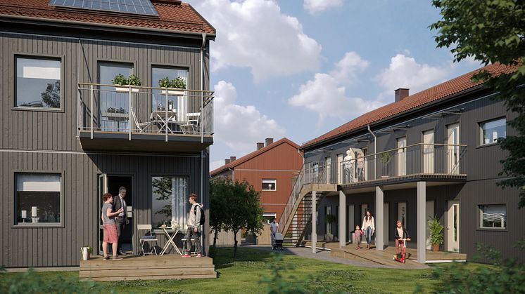 Illustration av det nya kvarteret BoKlok Krysset i Bålsta, med balkonger/altaner samt gemensamma grönytor och naturliga mötesplatser. 