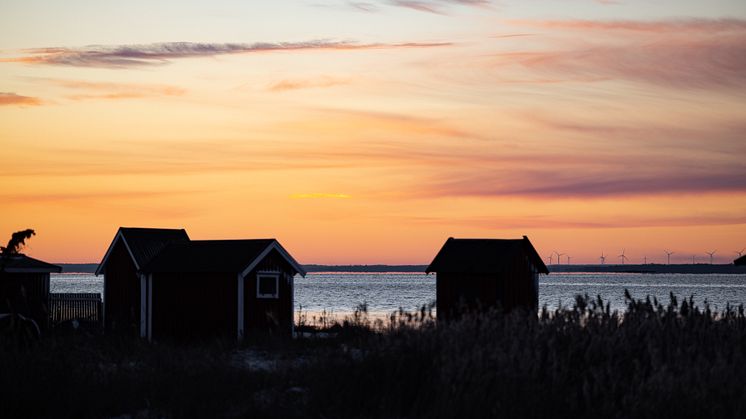 Vinterbild på sjöbodar