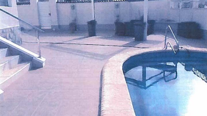 Photo of the pool at Drury's main residence in Spain which was restrained by HMRC