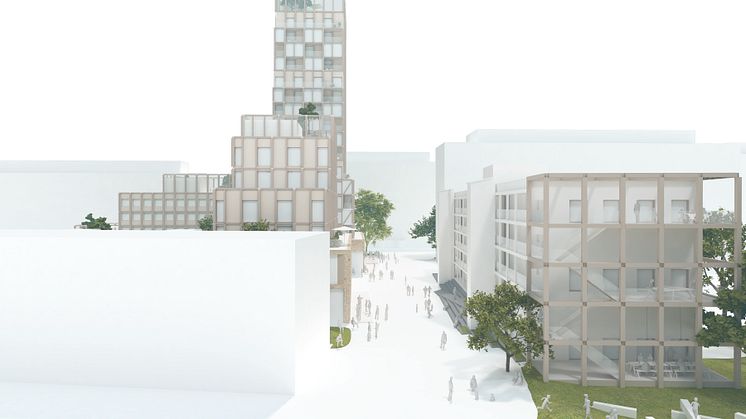 Bild: Stationsentrén. Vy från spårområdet in mot Rosengårdsstråket som kantas av ny bebyggelse, rörelse, möten och trygghet. Illustration: Kjellander Sjöberg. 