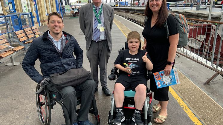 Just a boy who loves trains: 13-year-old Ryan Horrod has been given the confidence to continue travelling by train. Pictured (from left) GTR Accessibility Lead Carl Martin, Brighton's Area Station Manager Graham Thrower, Ryan and his mum, Anne