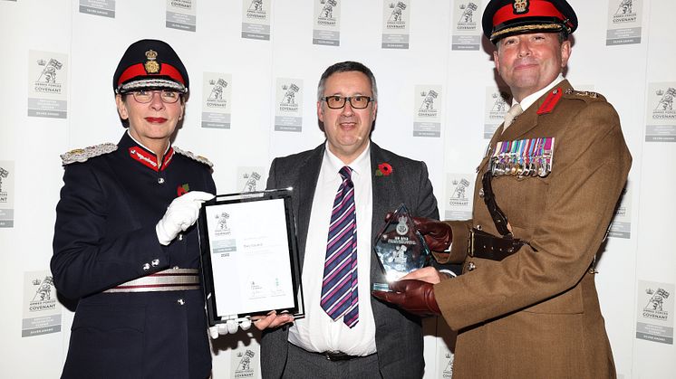 Cllr Richard Gold (centre) is presented with the Silver award by Diane Hawkins, the Lord Lieutenant of Greater Manchester, and Colonel Darren Doherty, Commander Army HQ North West.