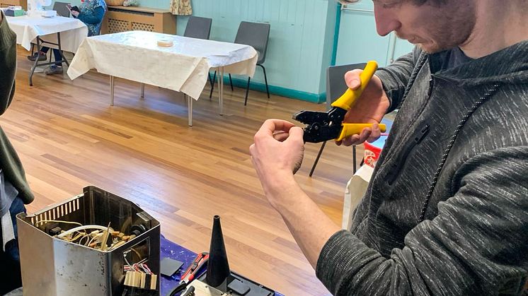 Dr Ollie Hemstock at one of the pop-up repair cafés