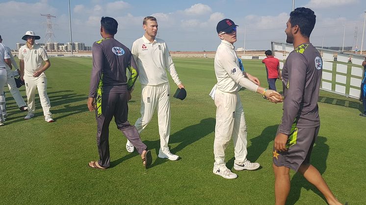Danny Briggs and Dom Bess congratulate Pakistan. Photo: Sporta Group