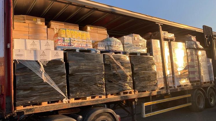 SCO NB 02 22 01 Illicit cigarettes and alcohol seized from a unit in Whitburn & loaded into a trailer by HMRC officers