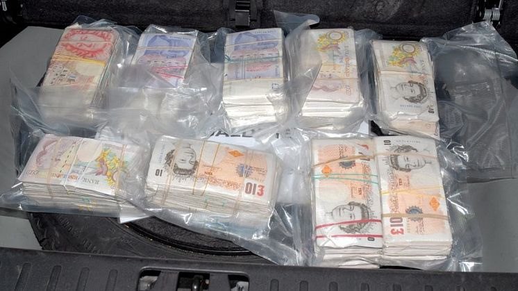 Two sentenced for dirty cash scam