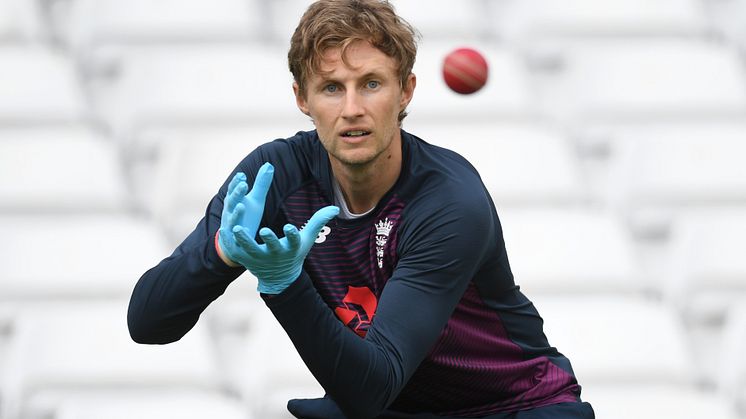 England Test captain Joe Root practising wearing disposable gloves during a training session at Trent Bridge as part of England's return to training protocols. (Getty Images)