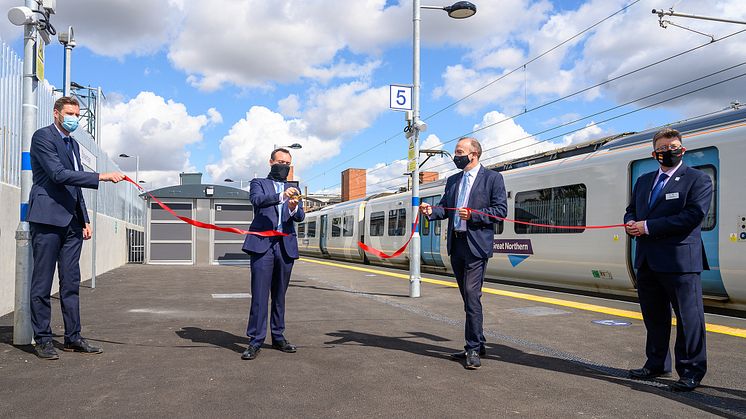 Stevenage MP Stephen McPartland cuts the ribbon with (l to r) Ed Akers, Principal Programme Sponsor, Network Rail; Chris Heaton-Harris MP,  Rail Minister; and Steve White, Chief Operating Officer, GTR