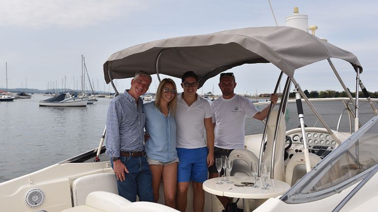 JL Audio's summer competition winners (centre) with JL Audio's Paul Baker (left) and The Boat Club's Mark Morris (Right)