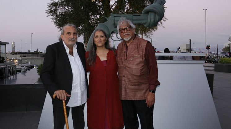 Oct 2nd Non-Violence Day Celebration - Founders Dr. Ogarit Younan and Dr. Walid Slaybi with Arun Gandhi in front of the unveiled knotted gun sculpture Non-Violence.