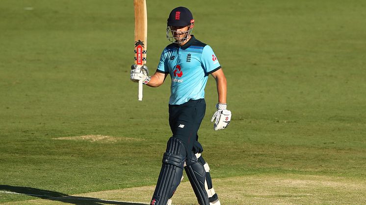 Sam Hain celebrates his century against Cricket Australia XI at Metricon