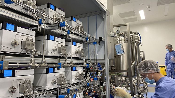 Pfizer scientists and equipment