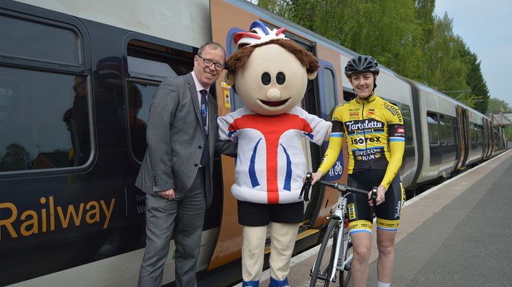 Richard Brooks (West Midlands Railway) and Pro Rider Beth Crumpton at Redditch railway station