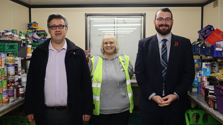 Trinity Foodbank organiser Tina Harrison meets councillors Richard Gold and Eamonn O’Brien.