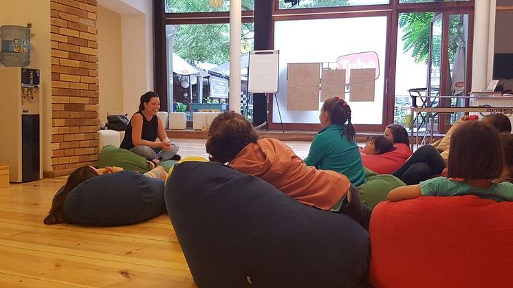 Adrienn Zemancsik discusses career with young girls attending the Skool project
