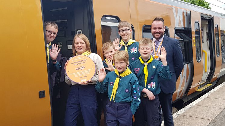 Group leader for 1st Astwood Bank Scouts, Sally Payne and area conductor manager for West Midlands Railway, Paul Cassidy, with some of the Scouts receiving their Cross City Heroes award at Redditch railway station