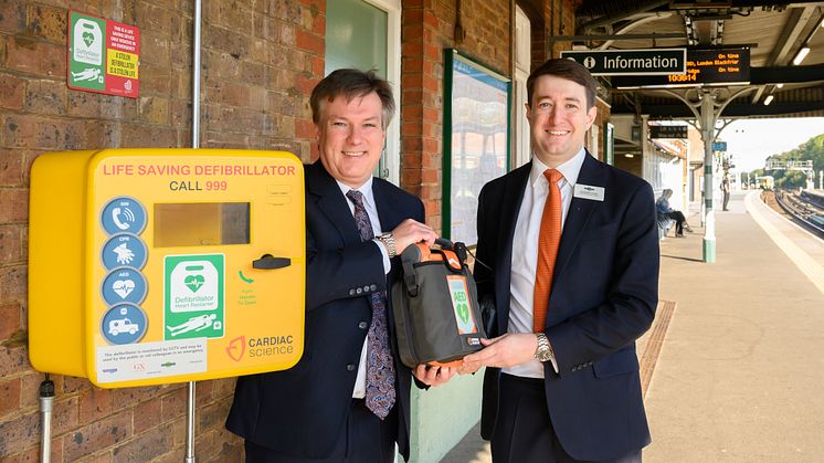 Defibrillators at every station - pictured at Three Bridges station with local MP