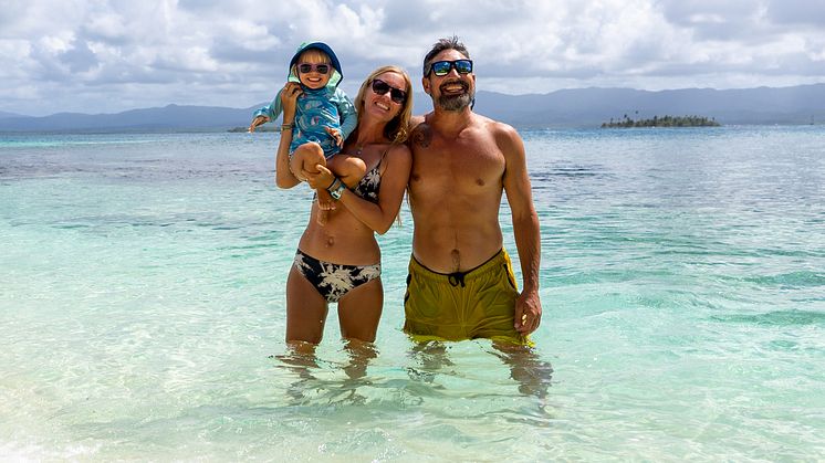 SV Delos - Karin, Brian and daughter Sierra in San Blas, Panama.jpg