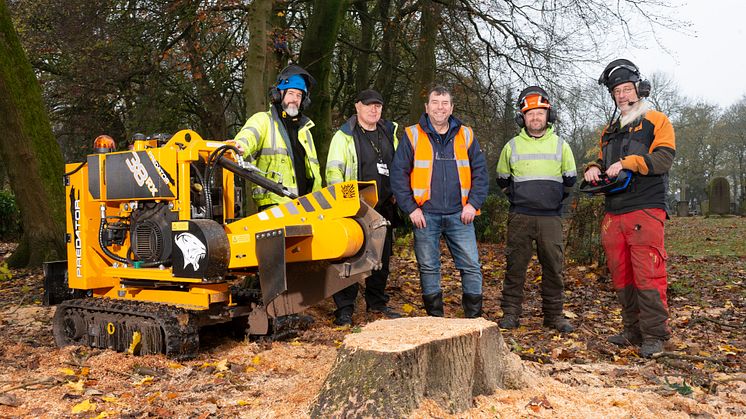 Cllr Alan Quinn (centre) with the tree team and the new machinery.