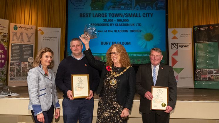 Blooming brilliant! At the awards ceremony are (from left) Teresa Potter, North West in Bloom judge; Kevin Dickinson, grounds maintenance manager; the Mayor of Bury, Councillor Jane Black; and Peter Turner, grounds maintenance foreman.