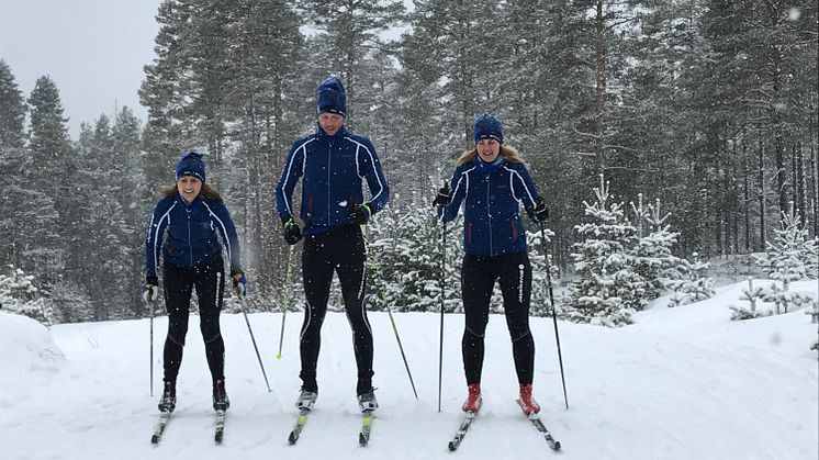 Three team members from the Bluewater ski team promoting an end to plastic pollution of the planet's seas, with Anders Jacobson center.