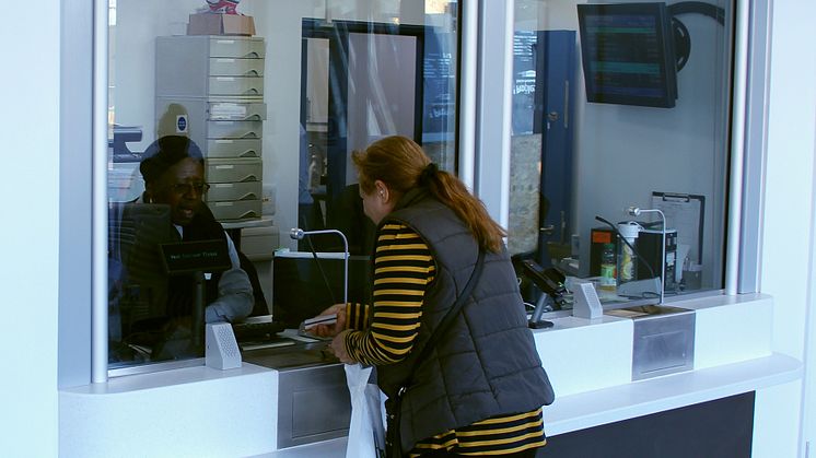 Serving from one of the three new ticket office windows