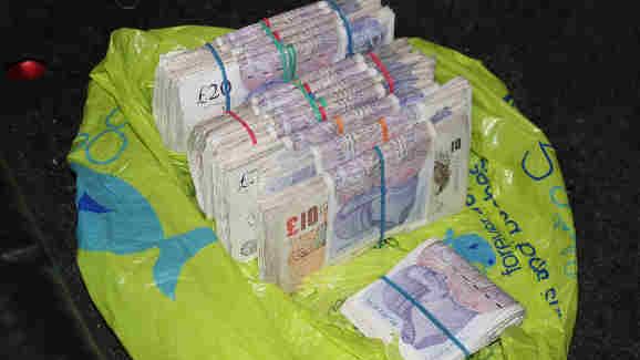 Op Quadrant Bundles of cash seized 2