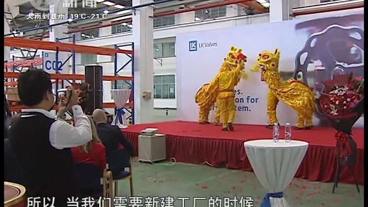 The grand opening of new factory in China on the TV news