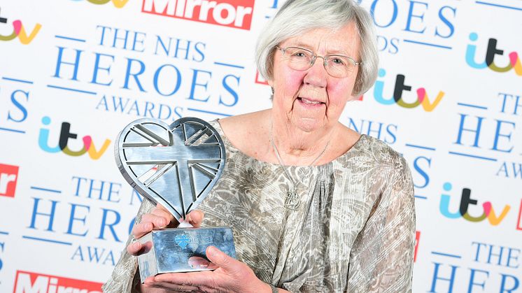 Averil Mansfield CBE holds her Lifetime Achievement Award 