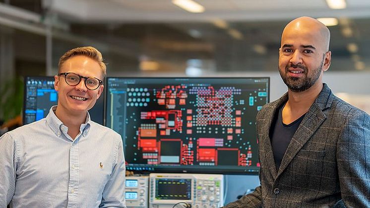 Kevin_and_Fredrik_in_front_of_PCB_layout-846x465