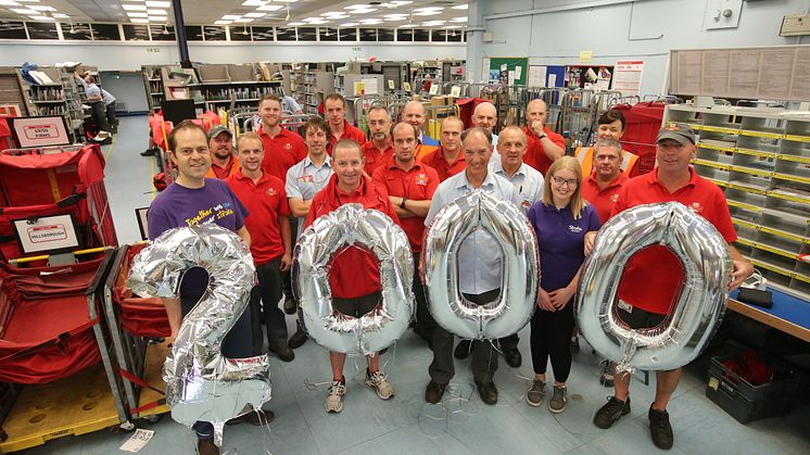 Staff from Royal Mail Lisburn Delivery Office with Paul Montgomery, Community Fundraising Manager and Aibhlin Neeson, Health and Wellbeing Coordinator, Stroke Association