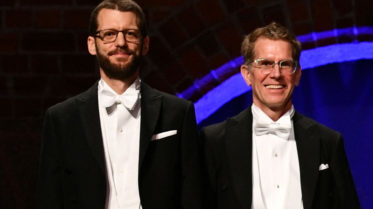 Tobias Kuemmerle & Scott Creel vid akademiens högtidssammankomst den 28 januari 2018. Foto: Erik Cronberg/KSLA.