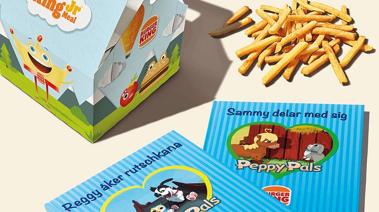 Burger Kings King Jr Meal tillsammans med två böcker ur Peppy Pals-serien.