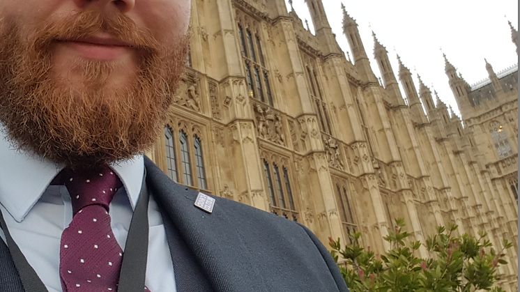 Euan Macfarlane outside The Houses of Parliament