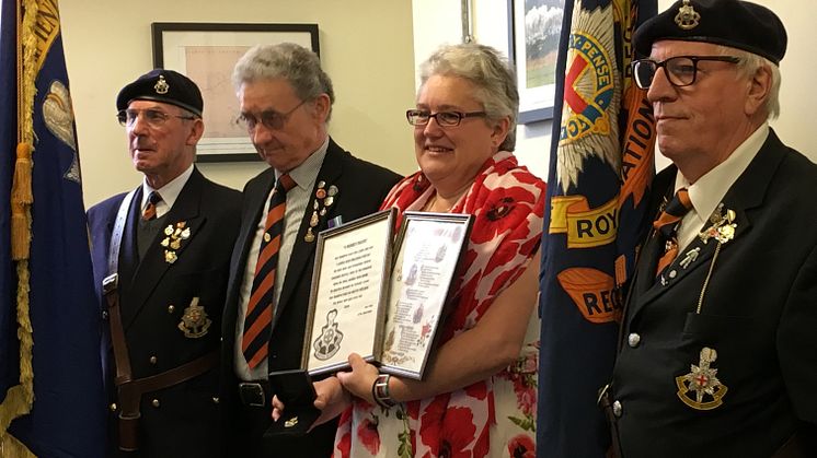 The Royal Sussex Regiment presented Laura Lee with certificates in recognition of her research project