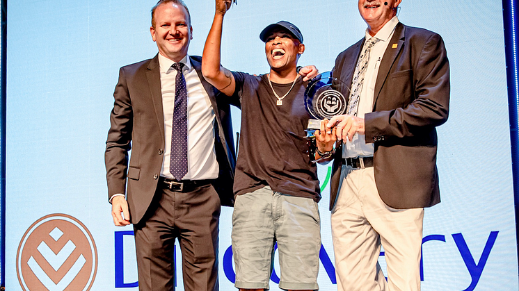 Discovery Insure CEO Anton Ossip (left) hands over the car keys to 2019 winner, Peterus Wagner, accompanied by ChildSafe chairperson Professor Sebastian Van As (right).