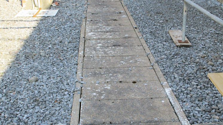 Mis en place de zone de restriction d'acces pour eviter le risque d'accident lie au passage de charges lourdes pendant le demantelement