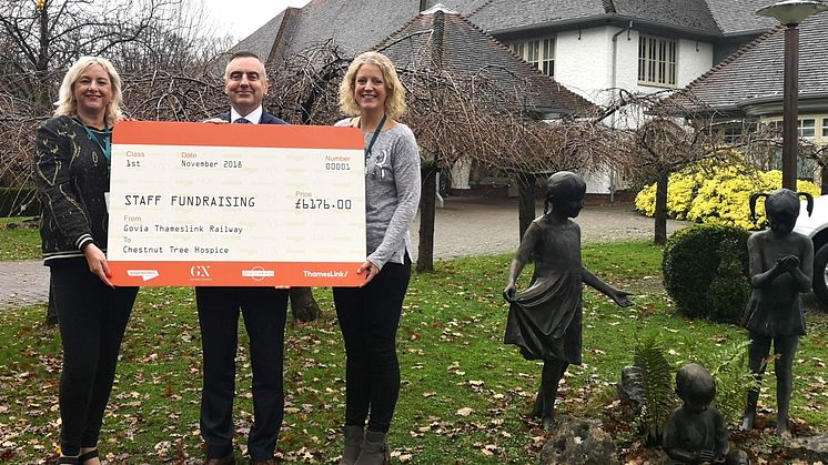 Andy Bindon, HR Director at GTR, presents the cheque to Chestnut Tree House's corporate fundraisers, Mikayla Bernstein (left) and Alison Taylor (right) at the Arundel-based children's hospital .