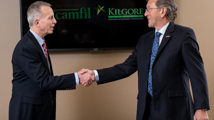 Armando Brunetti, president of Camfil Americas, and Kilgore mayor Ronnie Spradlin, speak about plans for Camfil USA to build a manufacturing facility in Kilgore's Synergy Park.  (Michael Cavazox/News-Journal Photo)